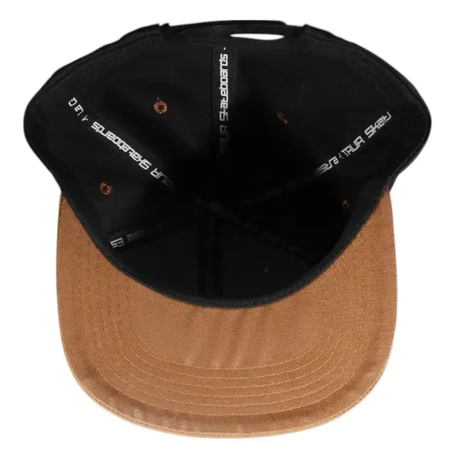 gorra-trur-la-calle-es-nuestra-snapback-negro-cafe-debajo-c42e7c86e058af3ff717436431856884-640-0-Photoroom.webp